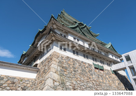 Nagoya castle, Nagoya, Aichi, Japan, Historic Japanese castle with stone foundation under clear blue sky Nagoya castle, Nagoya, Aichi, Japan, Historic Japanese castle with stone foundation under clear blue sky 133647088