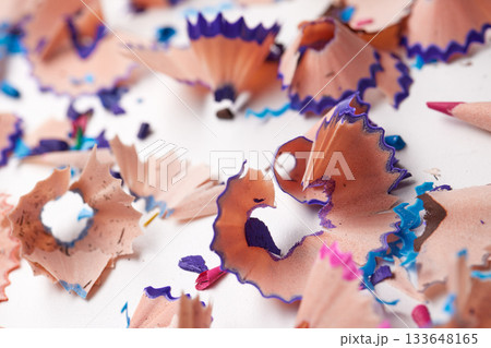 Pencil shavings scattered on white, symbolizing art, creativity, and education 133648165