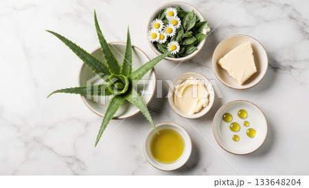 Natural Skincare Ingredients on White Marble Surface 133648204