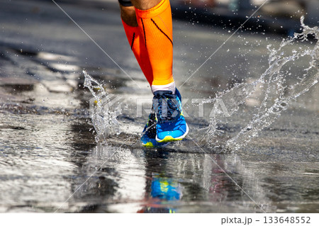 Runner feet in compression socks 133648552