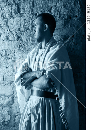 Ancient man at the window 133649189