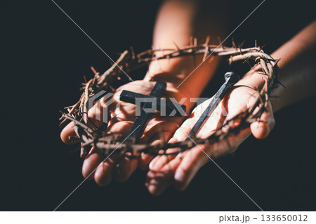 Closeup of Jesus Christ wearing crown of thorns during His crucifixion captures the suffering, sacrifice, and deep spirituality that define Easter and the core of Christian faith and religion. 133650012