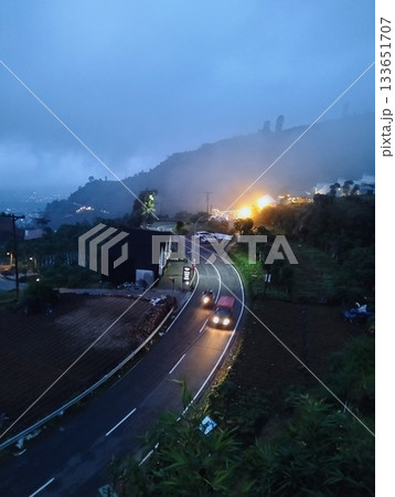 Twilight Journey on a Scenic Mountain Highway 133651707