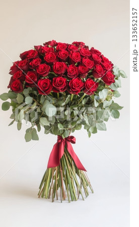 Elegant Red Roses Bouquet Tied With Plush Maroon Ribbon, Symbolizing Love, Romance, and Affection. Elegant Red Roses Bouquet Tied With Plush Maroon Ribbon, Symbolizing Love, Romance, and Affection. 133652157