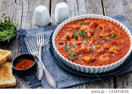 Shrimp in hot tomato sauce with garlic, onion Shrimp in hot tomato sauce with garlic, onion 133653616