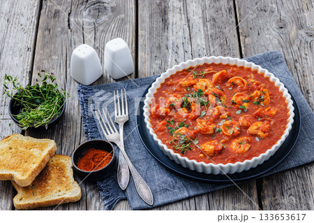 Shrimp in hot tomato sauce with garlic, onion Shrimp in hot tomato sauce with garlic, onion 133653617