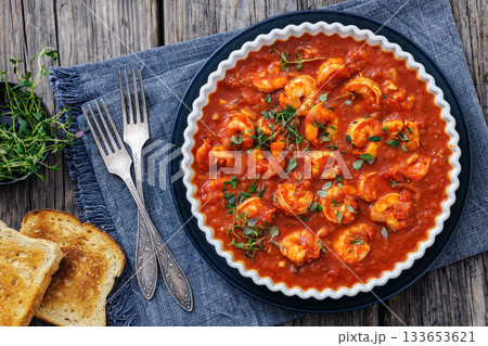 Shrimp in hot tomato sauce with garlic, onion Shrimp in hot tomato sauce with garlic, onion 133653621