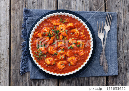 Shrimp in hot tomato sauce with garlic, onion Shrimp in hot tomato sauce with garlic, onion 133653622
