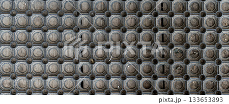 Holes rubber door mat for wiping foot with round holes texture asbtraction Holes rubber door mat for wiping foot with round holes texture asbtraction 133653893