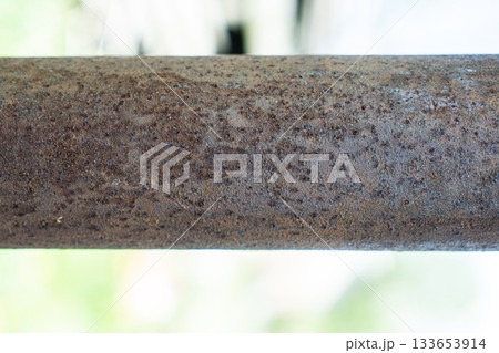 Rust. massive rusty old pipelines in an industrial area 133653914