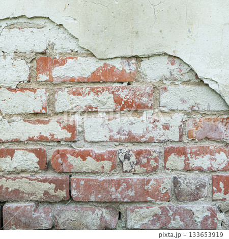 old brick wall, red and white colour, broken bricks, peeling plaster, vintage texture, background for banner, copy space 133653919