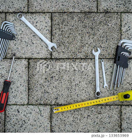 Greeting card of Fathers day. Flat set tools on stone pavement background Greeting card of Fathers day. Flat set tools on stone pavement background 133653969
