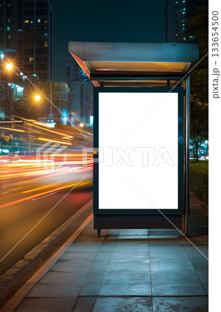 City bus stop mockup with long-exposure light trails and a clean customizable board 133654500