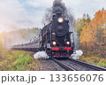 Steam retro train moves in the autumn forest. 133656076