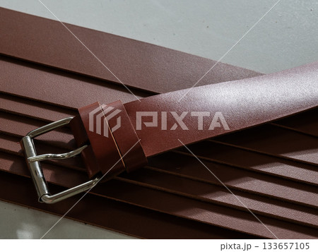 Close up of leather belts.  133657105