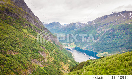 Fjord Geirangerfjord with ferry boat, Norway. Fjord Geirangerfjord with ferry boat, Norway. 133658910