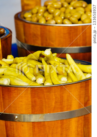 Olives and peppers for sale at market 133658937