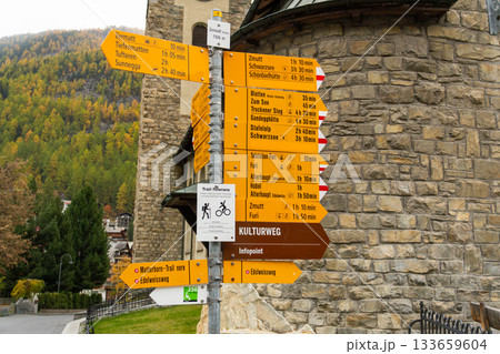 Hiking signpost in Zermatt, Switzerland, providing directions to destinations Hiking signpost in Zermatt, Switzerland, providing directions to destinations 133659604