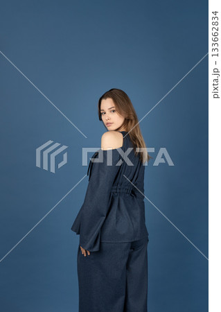 Beautiful woman with blue linen suit studio portrait Beautiful woman with blue linen suit studio portrait 133662834