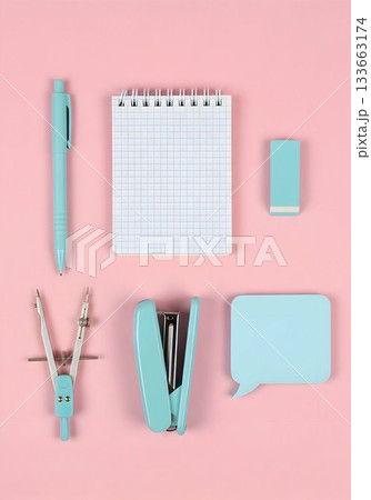 Pastel Blue Stationery Flatlay on Pink Background 133663174