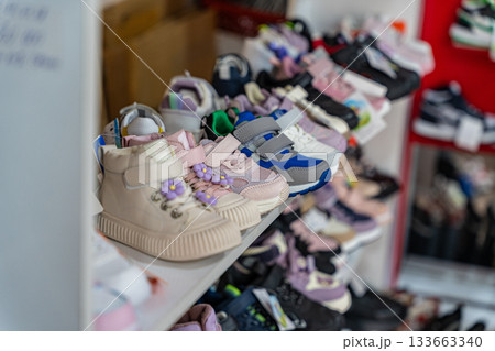 Colorful Children's Shoes Displayed in Store 133663340