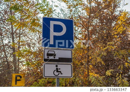 Parking Sign with Accessibility Symbol in Autumn 133663347