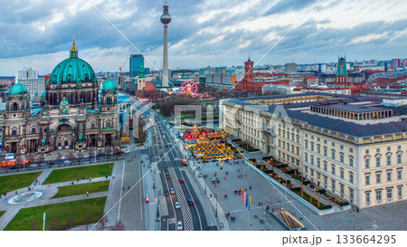 Awe drone point of view on Berlin Cathedral and opposite Christmas market and Berlin town HALL Awe drone point of view on Berlin Cathedral and opposite Christmas market and Berlin town HALL 133664295