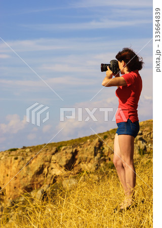Tourist take photo on nature Mani Greece Tourist take photo on nature Mani Greece 133664839