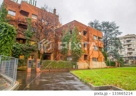 Not tall brown building in Italian city in winter 133665214