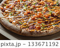 Close-Up of Freshly Baked Pizza with Colorful Toppings 133671192
