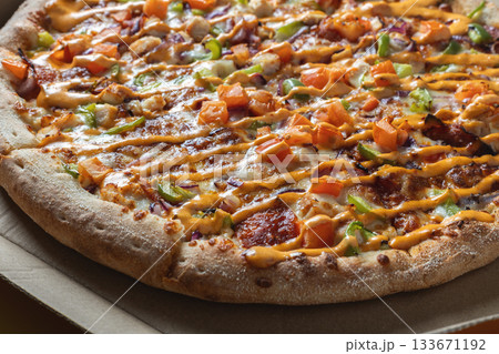 Close-Up of Freshly Baked Pizza with Colorful Toppings Close-Up of Freshly Baked Pizza with Colorful Toppings 133671192
