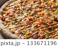 Close-Up of Freshly Baked Pizza with Colorful Toppings 133671196