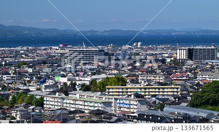 大村市(長崎県／新大村駅建設後)　遠景に針尾電波塔と西海橋(佐世保) 133671565