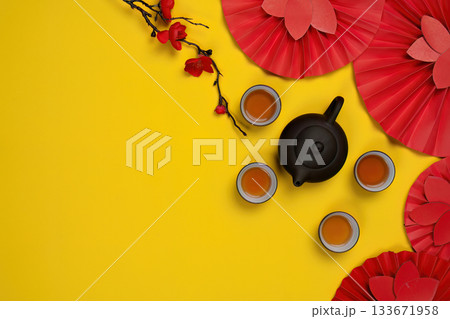 Bright Chinese New Year celebration with tea and decorations Bright Chinese New Year celebration with tea and decorations 133671958