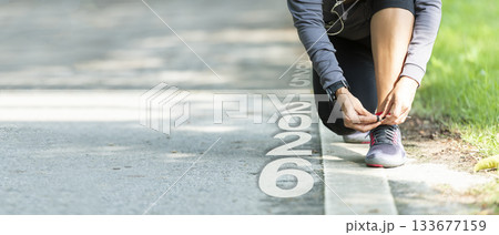 The start into the new year 2026. Start up of runner woman 133677159