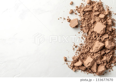 Light Brown Powdery Substance on White Background for Natural and Organic Concepts 133677670
