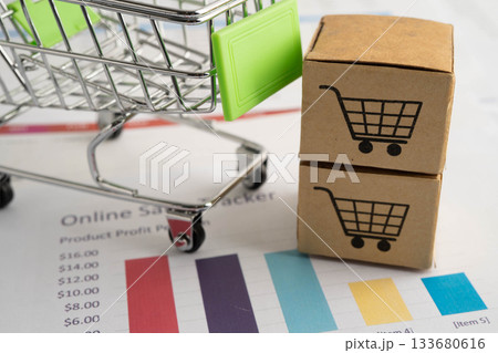 Online shopping, Shopping cart box on business graph, import export, finance commerce. Online shopping, Shopping cart box on business graph, import export, finance commerce. 133680616