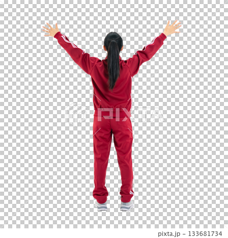 A back view of a female student in a gym jersey raising her arms in a cheer. A transparent, hand-cut, full-body PNG photo. 133681734