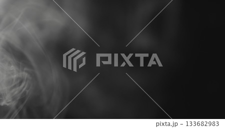 closeup vapor floating in air on black background 133682983