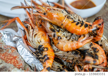 Grilled river prawns served on plate Grilled river prawns served on plate 133683331
