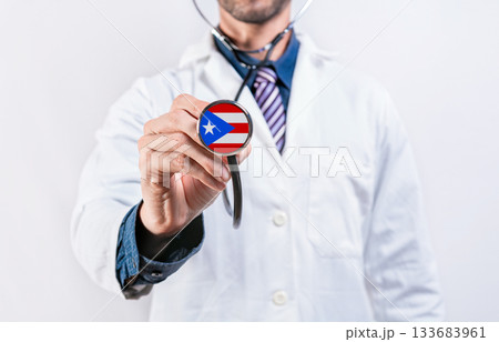 Puerto Rico healthcare system, doctor holding stethoscope. Puerto Rico health and medical insurance concept 133683961