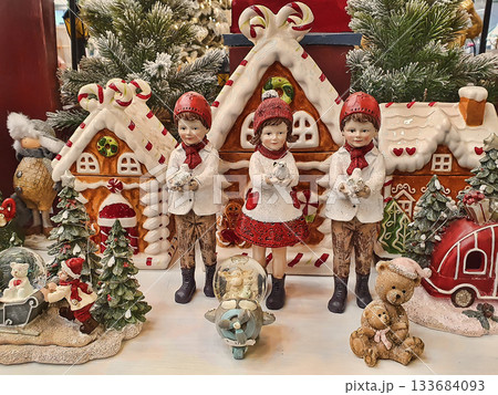 Christmas souvenirs, tableware with New Year's ornaments, fairy-tale figurines of children and animals Christmas souvenirs, tableware with New Year's ornaments, fairy-tale figurines of children and animals 133684093