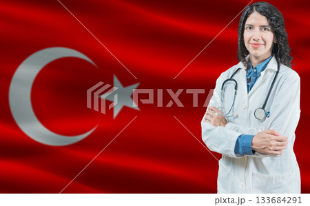 Turkish medicine and healthcare concept. Doctor close up against Turkey flag background 133684291