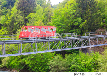 Red funicular to Niesen mountain in Switzerland Red funicular to Niesen mountain in Switzerland 133685096