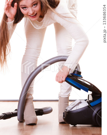 Funny girl with vacuum cleaner. Housework Funny girl with vacuum cleaner. Housework 133686354