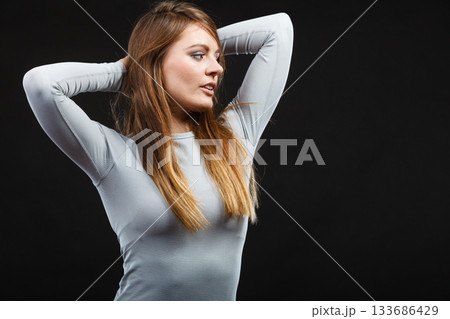 Sport fit woman in thermal clothes. 133686429