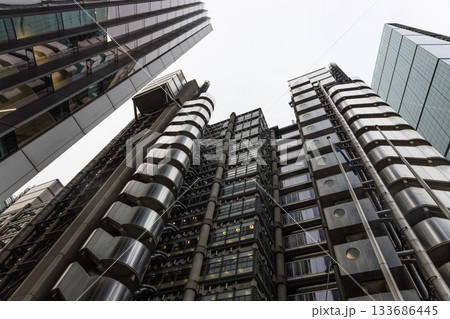 Low angle view of modern industrial skyscraper architecture in London, UK Low angle view of modern industrial skyscraper architecture in London, UK 133686445