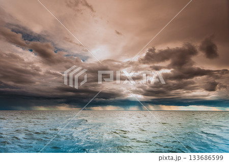 Seascape evening Baltic sea sunset horizon and cloudy sky.  133686599