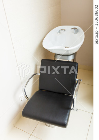 Chair with bowl in hairdresser salon Chair with bowl in hairdresser salon 133686602