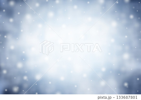 Magical winter background with snow, snowflakes and soft bokeh lights on blue sky, cold backdrop for Christmas. 133687801